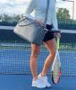 The LAVA medium tennis duffle bag is made of high quality pebble vegan leather;  with separate key and bottle holders. Specially designed racquet pock